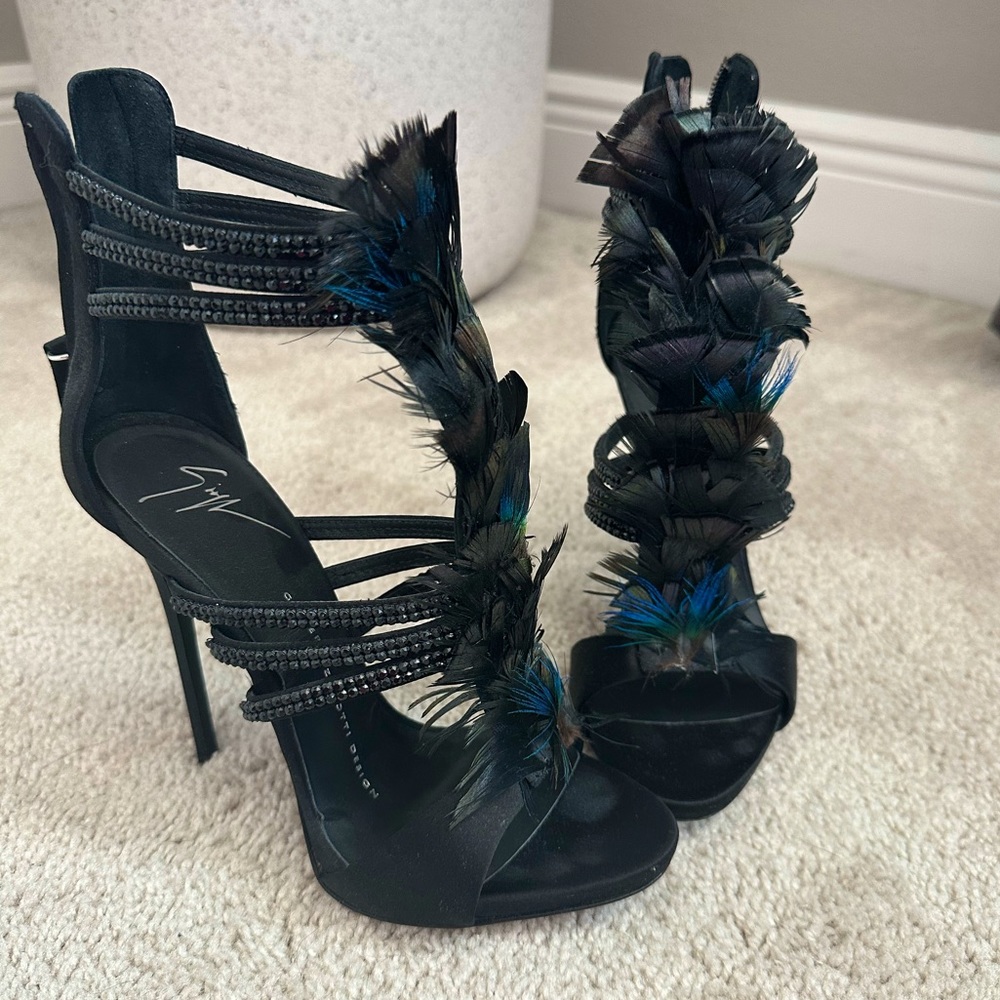 Giuseppe Zanotti heels with zip closure and crystal and feather embellishments
